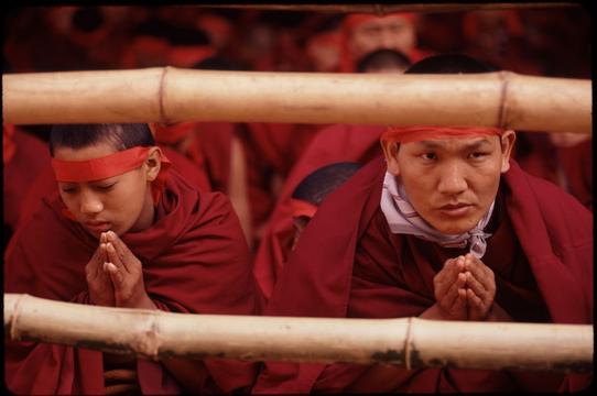 Monks participating in the Kalachakra, a Tibetan ceremony led by the Dalai Lama that is both a world-blessing and an initiation for monks.