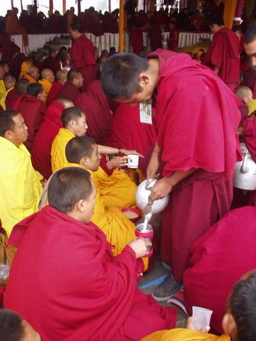 More tea-pouring of monks, 2003 Kalachakra Initiation, Bodhgaya.