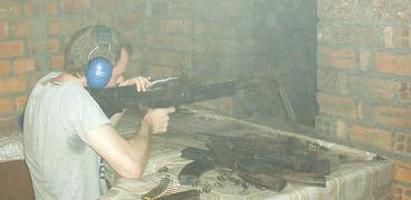 Firing an M-60, Phenom Penh.