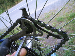 My destroyed derailleur after the bottom cog came apart.